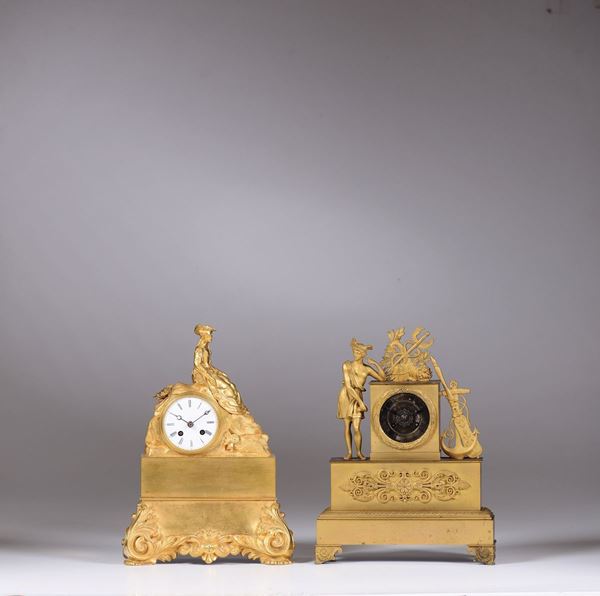 Lotto di due pendole da tavolo in bronzo dorato Carlo X, XIX secolo