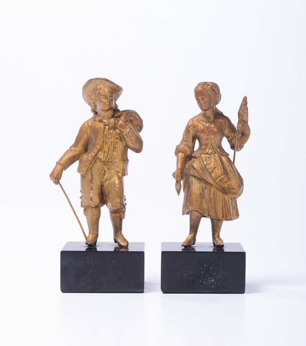 Due figure in bronzo dorato, XX secolo