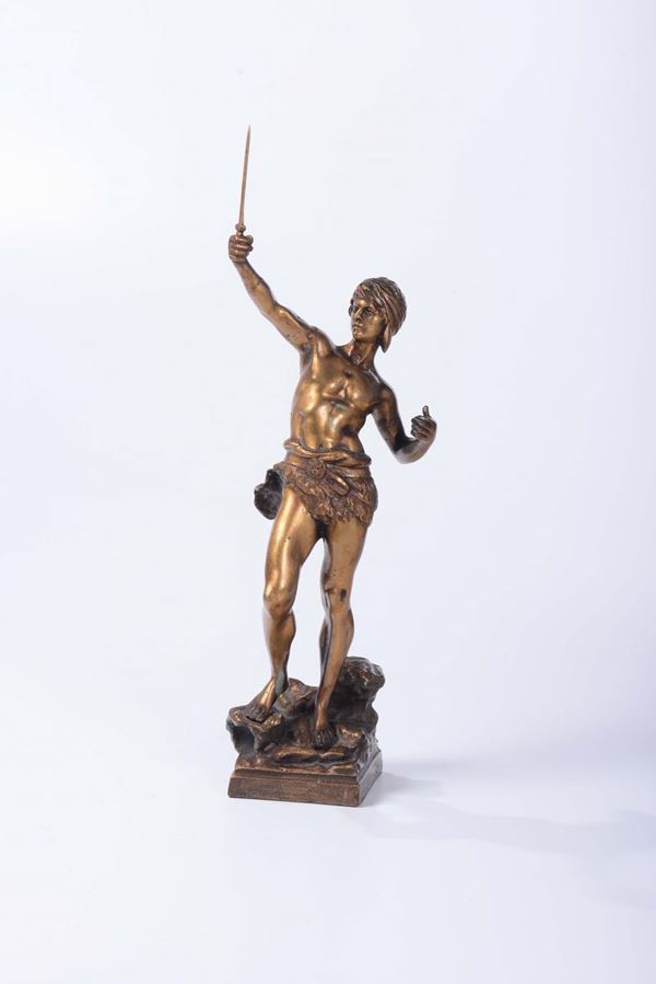 Bronzo dorato raffigurante guerriero con spada