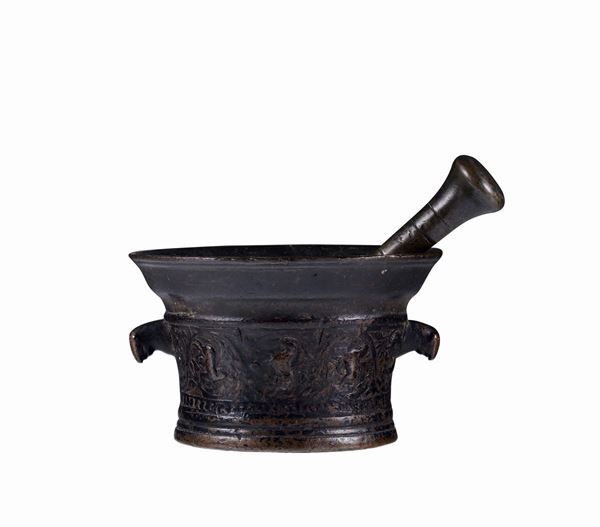 A bronze mortar and pounder, 16th century smelter