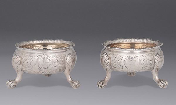 A pair of sterling silver salt shakers, London 1756, maker David Hennel (?)