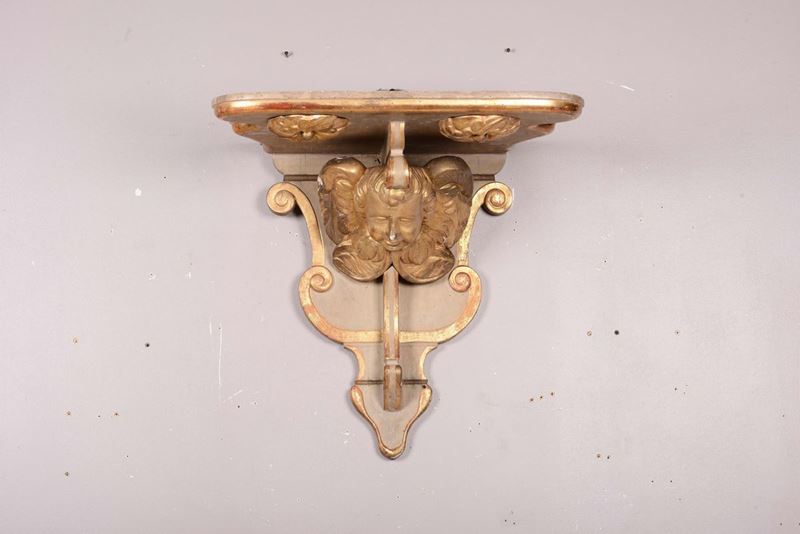 Grande mensola in legno laccato e dorato con testa di putto, XIX secolo  - Asta Antiquariato - Cambi Casa d'Aste