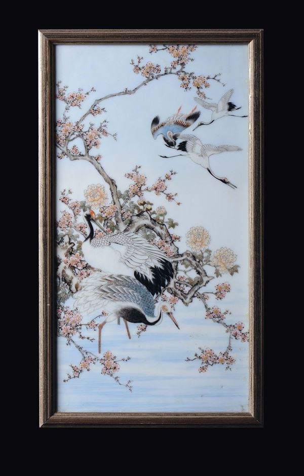 A pair of polychrome enamelled porcelain plaques with storks, Japan, Kutani, 19th century