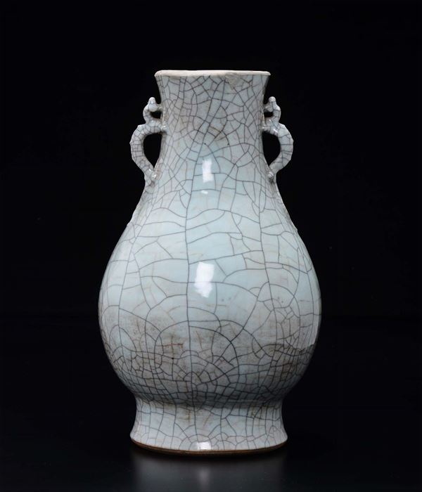 A Guan-type porcelain double handles vase, China, Qing Dynasty, 19th century