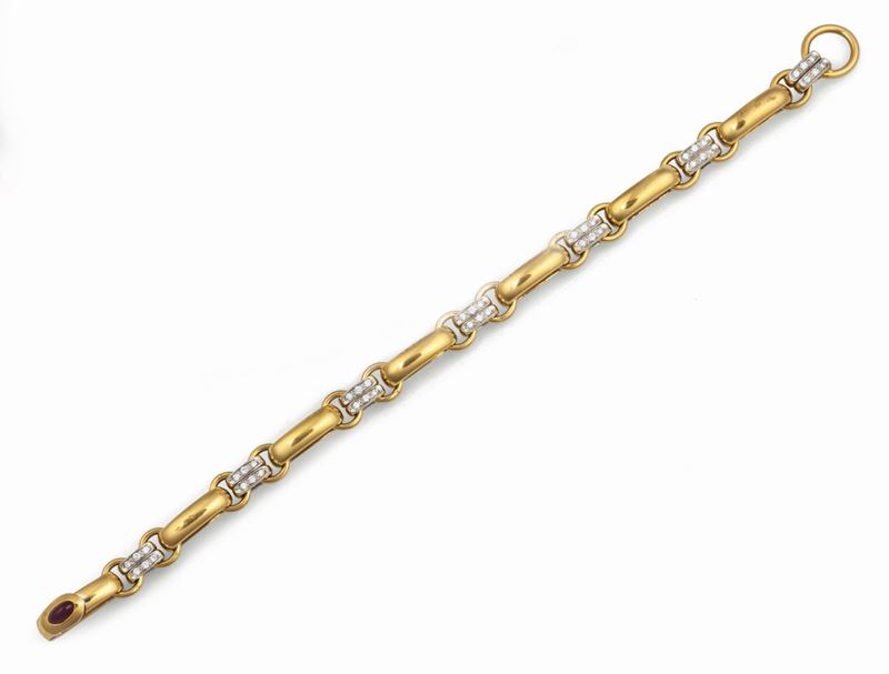 Bracelet with diamonds and a cabochon-cut ruby on the clasp set in yellow gold, Pomellato  - Auction Fine Jewels - Cambi Casa d'Aste