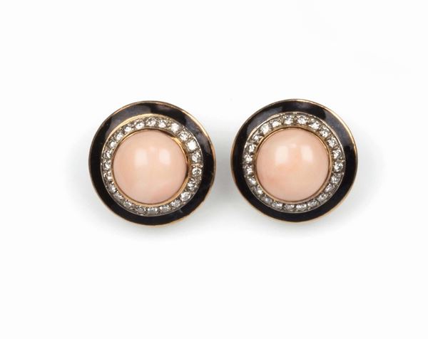 Clip earrings in pink coral with diamonds and black enamel set in yellow gold