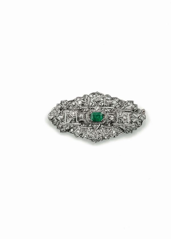Savonette brooch with an emerald and diamonds set in platinum