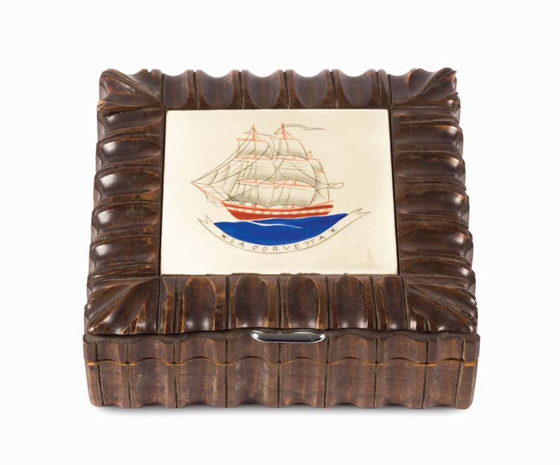 A carved wood box with a ceramic tile inserted in the lid, circa 1940.  - Auction 20th Century Decorative Arts - Cambi Casa d'Aste