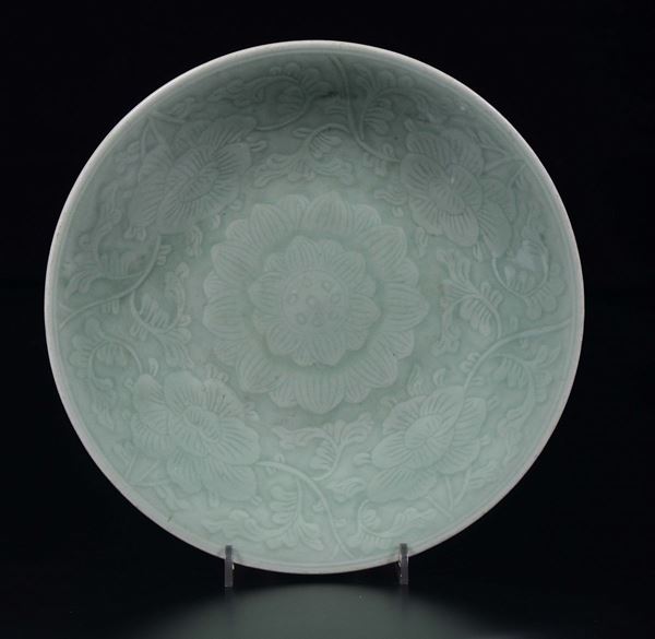 A celadon porcelain dish with lotus flowers, China, 20th century