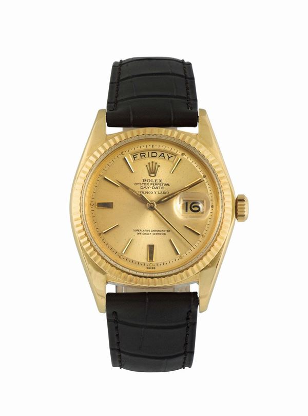 ROLEX, Oyster Perpetual Day- Date- Serpico Y Laino, Superlative Chronometer Officially Certified, case No. 704516, Ref. 1803, rare, center seconds, self-winding, water-resistant, 18K yellow gold wristwatch with day and date with a Rolex 18K yellow gold buckle. Made circa 1960