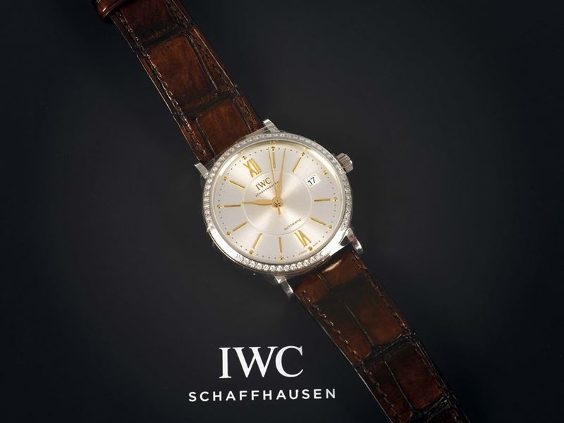 IWC, Schaffausen, Automatic, PORTOFINO, stainless steel and diamonds, self-winding wristwatch with date and an original buckle. Accompanied by the original box and Guarantee.  - Auction Watches and Pocket Watches - Cambi Casa d'Aste