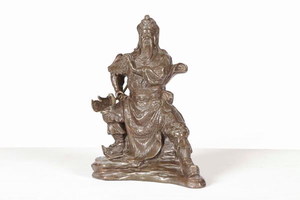 A bronze figure of warrior, China