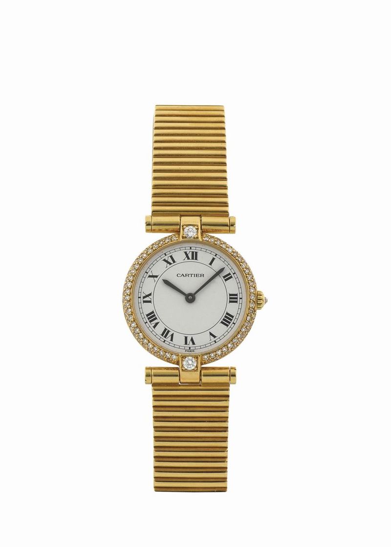 CARTIER, orologio da polso, da donna, al quarzo, in oro giallo 18K e brillanti con bracciale in oro Cartier. Realizzato circa nel 1990  - Asta Orologi da Polso e da Tasca - Cambi Casa d'Aste