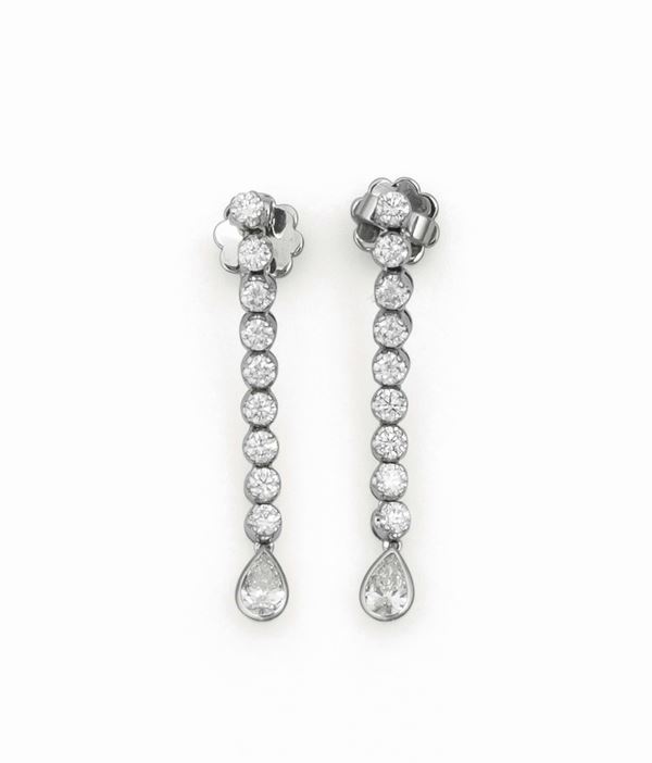 Pendant earrings with brilliant-cut and pear-cut diamonds set in white gold