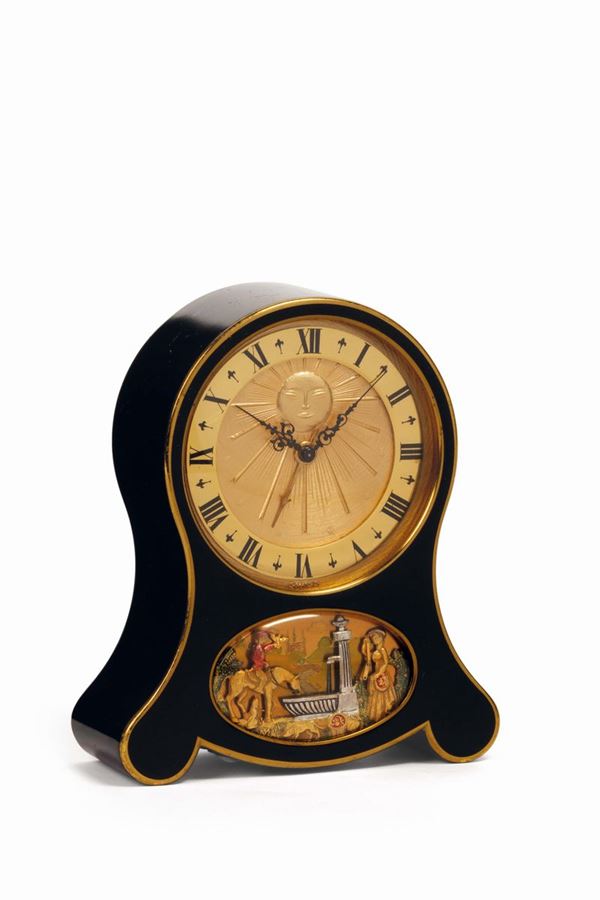 JAEGER, Swiss. Fine and unusual eight-day going, musical alarm clock with automaton scene. Made in the 1940's