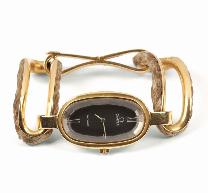 OMEGA, DE VILLE, per Scavia, orologio da polso, in oro giallo 18K con bracciale in oro. Realizzato circa nel 1970 circa  - Asta Orologi da Polso e da Tasca - Cambi Casa d'Aste