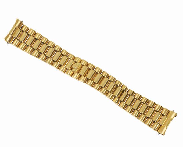 ROLEX, an 18K yellow gold President bracelet.