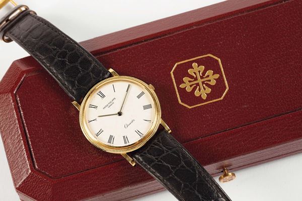 PATEK PHILIPPE, Geneve, 18K yellow gold quartz wristwatch with an 18K yellow gold buckle. Accompanied by the original box. Made in the  1990's.