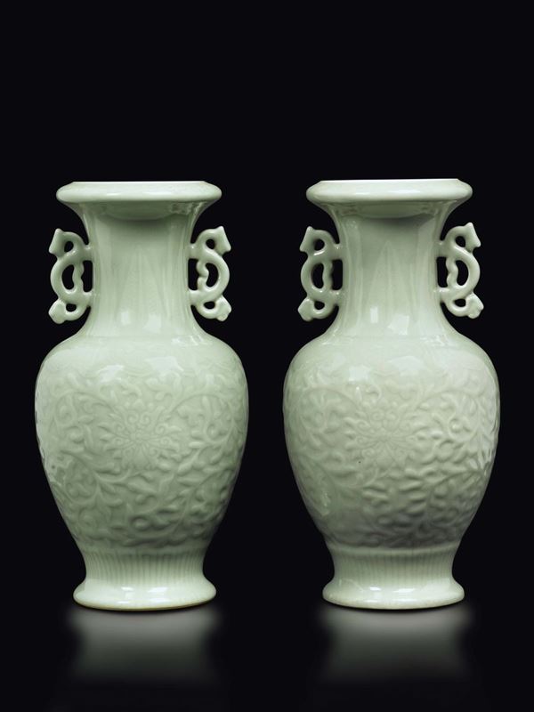 A pair of Celadon double handles vases with lotus flowers, China, Qing Dynasty, 19th century