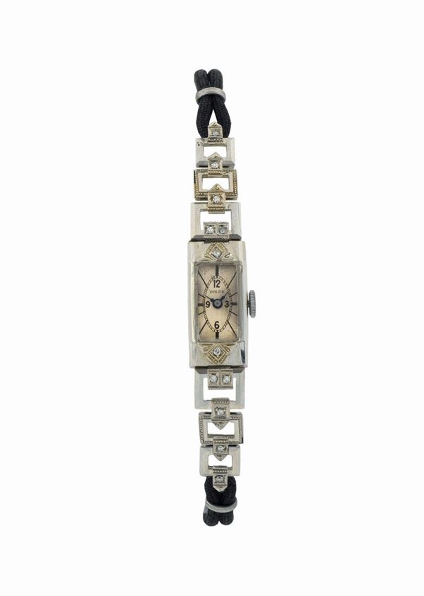 DULUX, orologio da polso, da donna, in oro bianco 18K e diamanti.  Realizzato nel 1920 circa