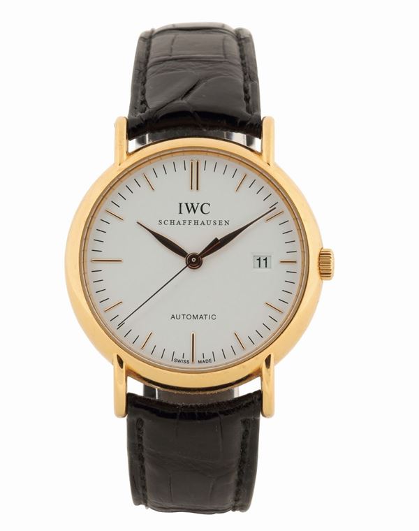 IWC, Portofino, Automatic”. Fine, self-winding, center seconds, water resistant, 18K yellow gold wristwatch with date and a gold IWC buckle. Made circa 2000's. Accompanied by the original Guarantee and instruction booklet. Venduto nel 2010