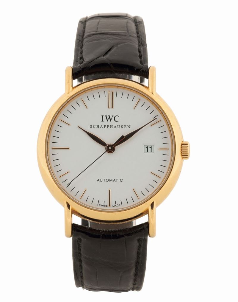IWC, Portofino, Automatic”. Fine, self-winding, center seconds, water resistant, 18K yellow gold wristwatch with date and a gold IWC buckle. Made circa 2000's. Accompanied by the original Guarantee and instruction booklet. Venduto nel 2010  - Auction Watches and Pocket Watches - Cambi Casa d'Aste