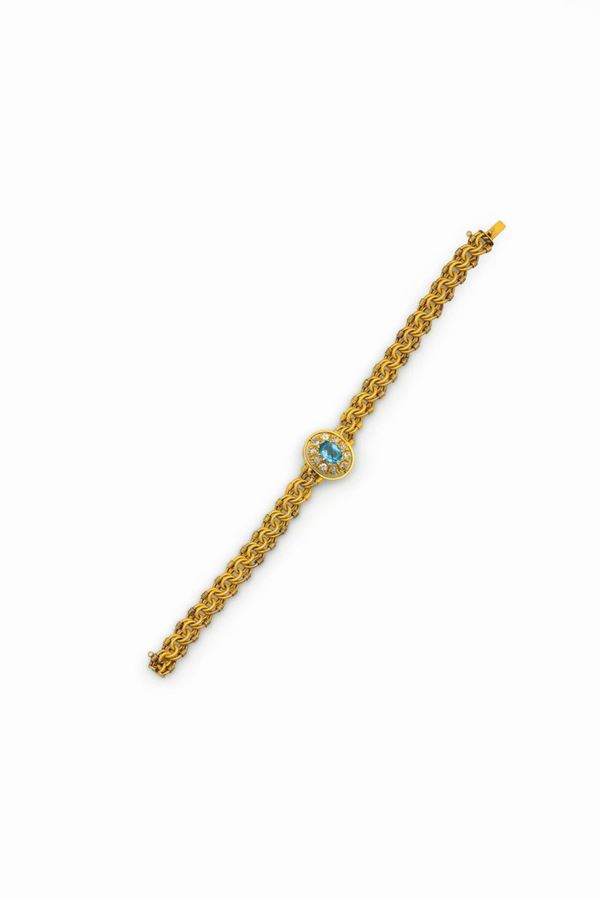 Aquamarine and diamond bracelet set in yellow gold