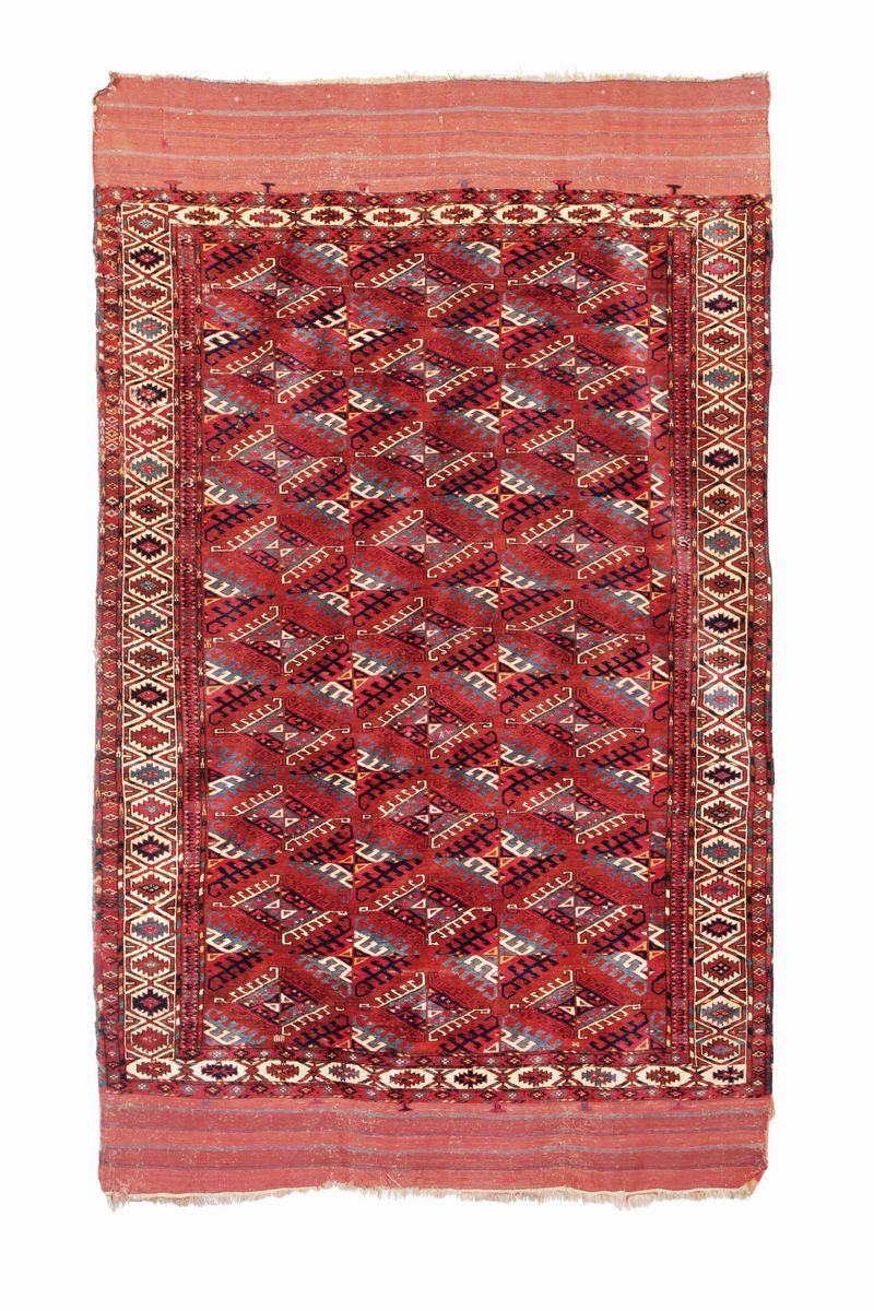 A Yomut main caroet rug, west Turkmenistan, early 20th century. Perfect condition - the 2 extremities still present the original Kilim.  - Auction Fine Carpets - Cambi Casa d'Aste