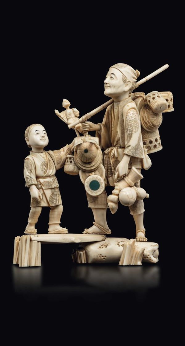 A large carved ivory group with peasant and children, Japan, early 20th century