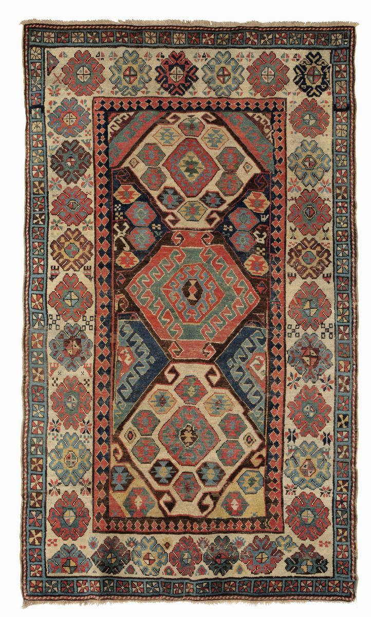 A Caucasus rug, late 19th century. Extremities redone and bulge repair in the inferior extremity. cm 228x138  - Auction Fine Carpets - Cambi Casa d'Aste