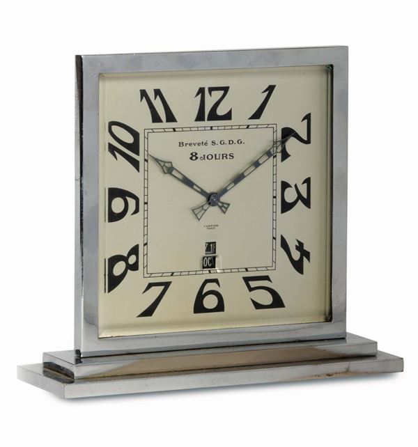 CARTIER, Breveté S.G.D.G, rare, 8 day power reserve Art Decò, metal table clock with calendar. Made circa 1925