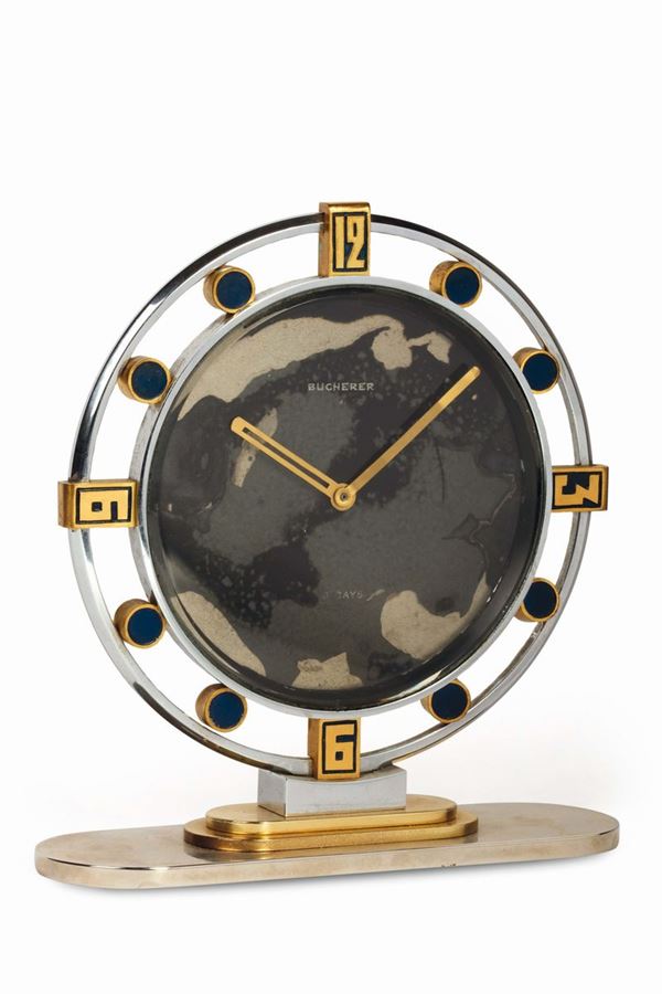 BUCHERER, orologio da tavolo, in acciaio e inserti in lapislazzuli con riserva di carica 8 giorni. Realizzato nel 1920 circa