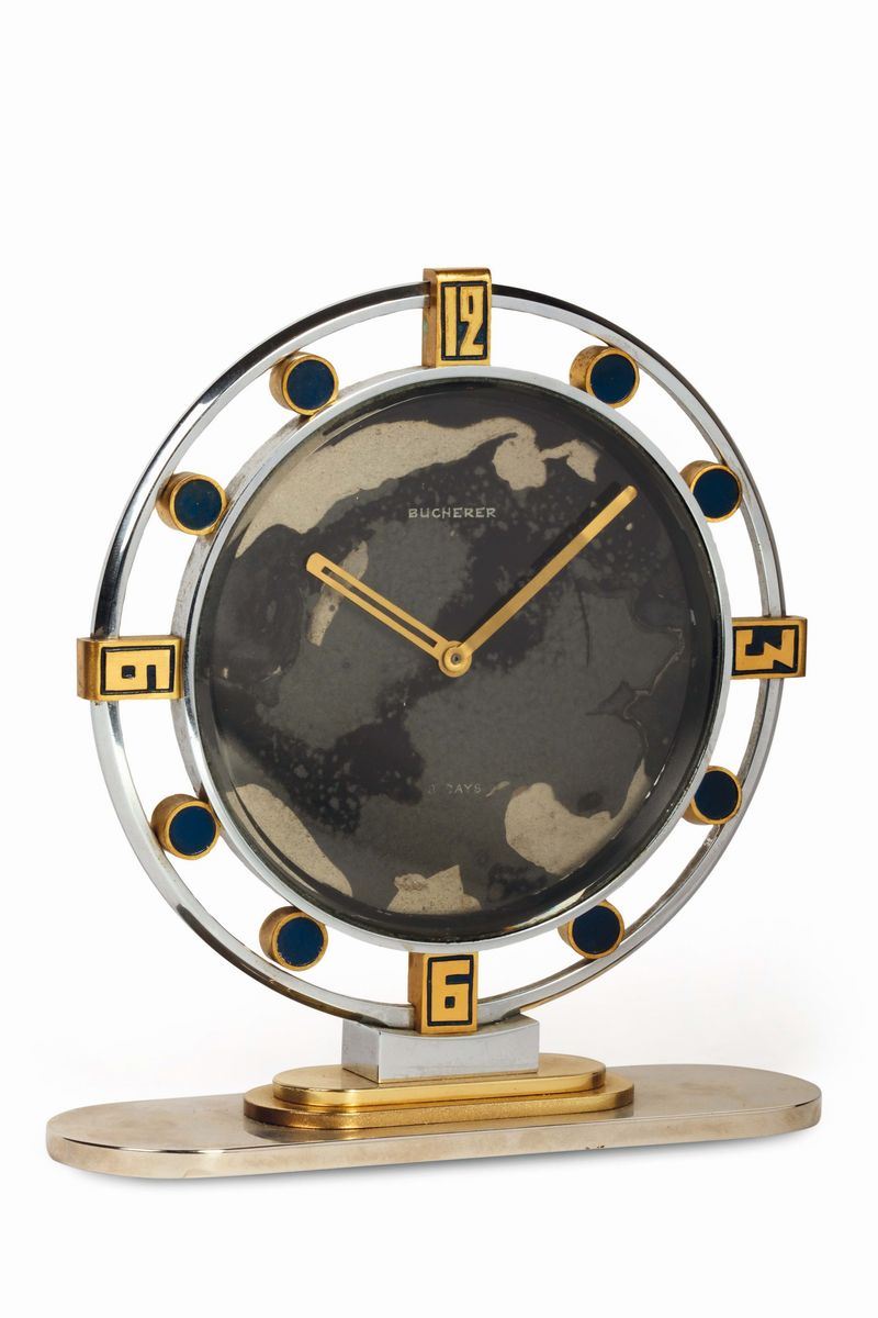 BUCHERER, orologio da tavolo, in acciaio e inserti in lapislazzuli con riserva di carica 8 giorni. Realizzato nel 1920 circa  - Asta Orologi da Polso e da Tasca - Cambi Casa d'Aste