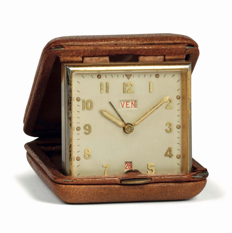 IMHOF, Pendulette portefeuille de voyage, gilted brass table clock with calendar and 8 days power reserve. Made circa 1940  - Auction Watches and Pocket Watches - Cambi Casa d'Aste