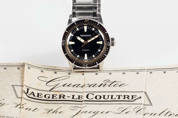 JAEGERLECOULTRE, Voguematic, water resistant, self-winding, stainless steel wristwatch with steel bracelet. Made circa 1960. Accompanied by the original Guarantee