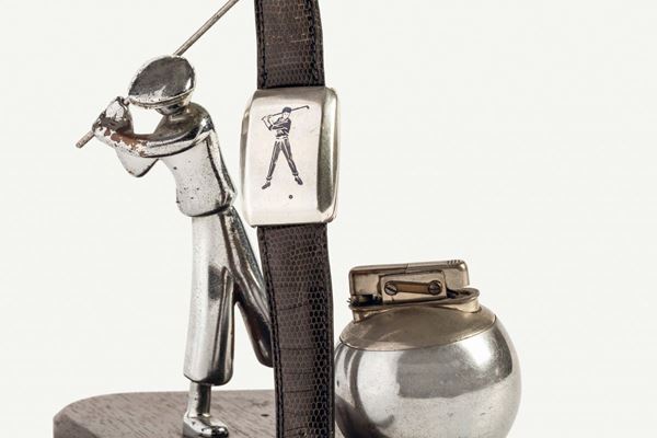 TIFFANY, case No. 202539, silver golf wristwatch. Accompanied by the original box and a lighter. Made circa 1920
