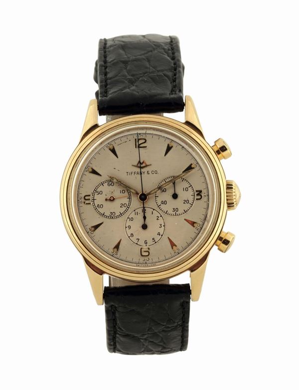 MOVADO, TIFFANY&Co, 18K yellow gold chronograph wristwatch with an original buckle. Made circa 1960