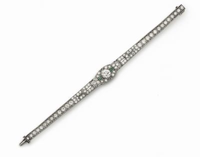 Harry Winston. Bracciale con Diamante Centrale di Ct 2,00 Circa, Diamanti e Smeraldi