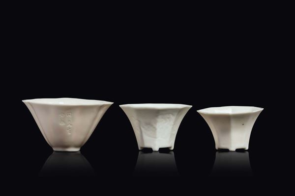 Three different Dehua cups, two with inscriptions and one with fawns, China, Qing Dynasty, late 17th century