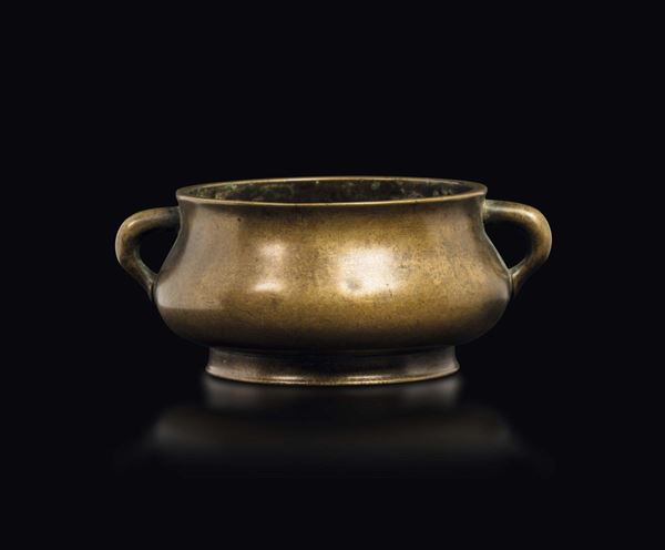 A gilt bronze two handles censer, China, Ming Dynasty, 17th century