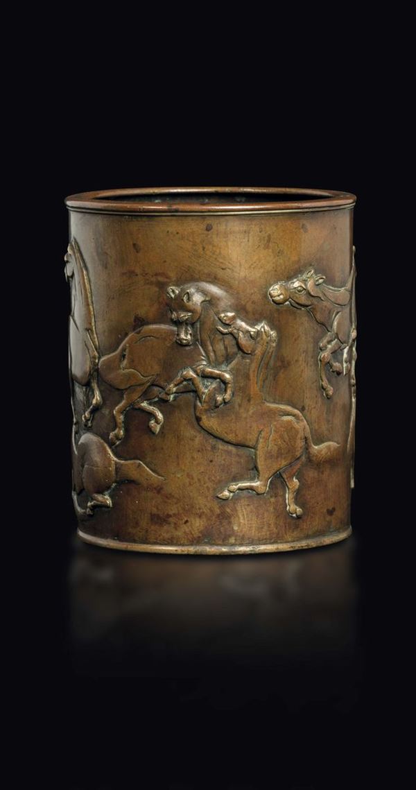 A bronze brushpot with horses in relief, China, Qing Dynasty, 18th century