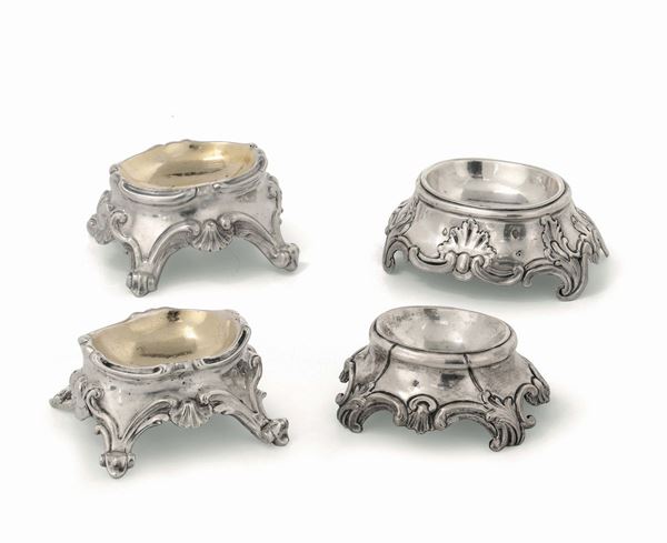 Lot made up of four salt cellars in molten, embossed and chiselled silver, Italian manufacture, second half of the 18th century. Marks: Saint Maurice cross, bull's head and flower; Letter T, capital and cursive; Roman cameral stamp, and two other unidentified marks