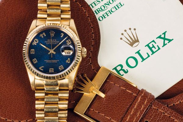 ROLEX, Oyster Perpetual Datejust, Superlative Chronometer Officially Certified, Ref. 16238. Fine and rare, center seconds, self-winding, water-resistant, 18K yellow gold wristwatch with date and an 18K yellow gold Rolex President bracelet with hidden deployant clasp. Accompanied by the original box, papers and Guarantee. Sold in 1982