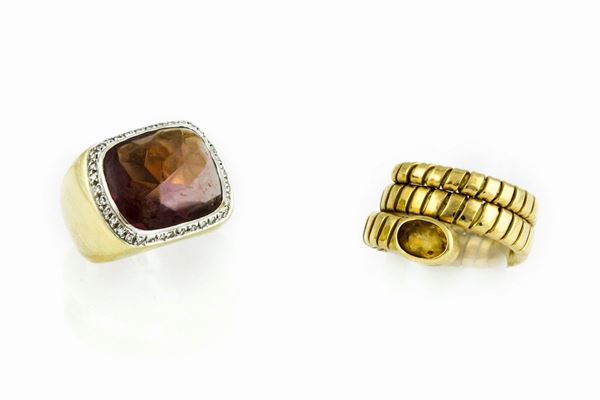 One tourmaline ring and one synthetic stone ring