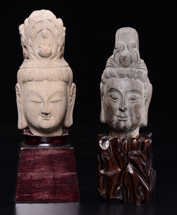 Two carved stone Buddha's heads, Thailand, 17th century