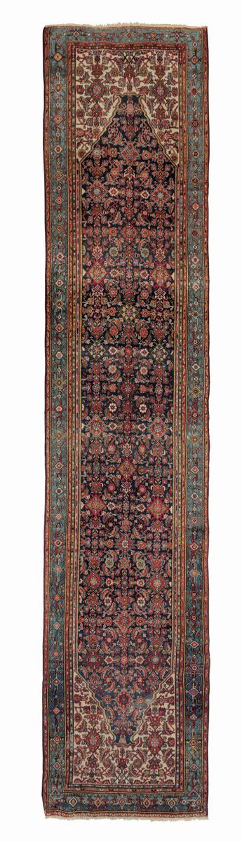 A Malayer runner rug, north west Persia, early 20th century. Some low areas.