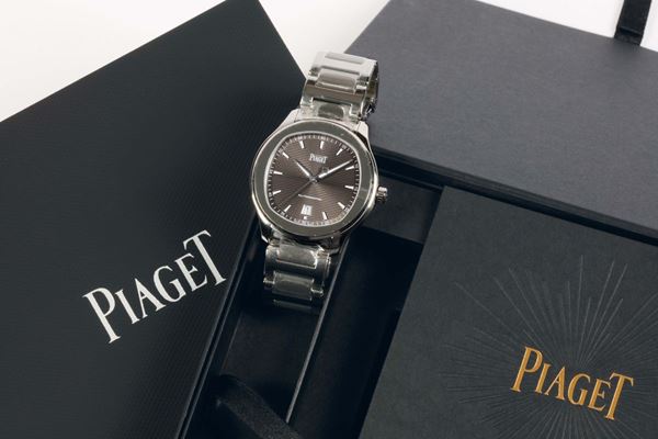 PIAGET, POLO AUTOMATIC, REF.41003, water resistant, self-winding, stainless steel wristwatch with date and a steel original bracelet with deployant clasp. Made in 2016. Accompanied by the original box, hang tag and Guarantee