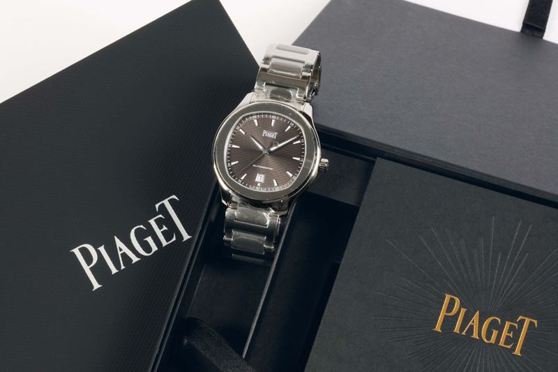 PIAGET, POLO AUTOMATIC, REF.41003, water resistant, self-winding, stainless steel wristwatch with date and a steel original bracelet with deployant clasp. Made in 2016. Accompanied by the original box, hang tag and Guarantee  - Auction Watches and Pocket Watches - Cambi Casa d'Aste