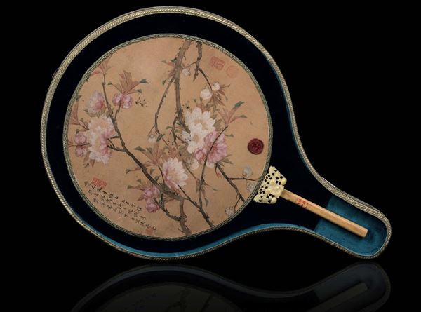 A painted fan with flowers and inscriptions and a not coeval landscape, with carved ivory handle, China, Qing Dynasty, 18th/19th century
