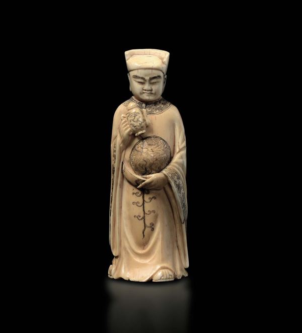 A carved ivory figure of dignitary with teapot, China, Qing Dynasty, 18th century